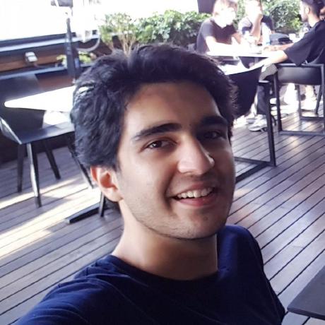 Erfan Riazati smiling outdoors